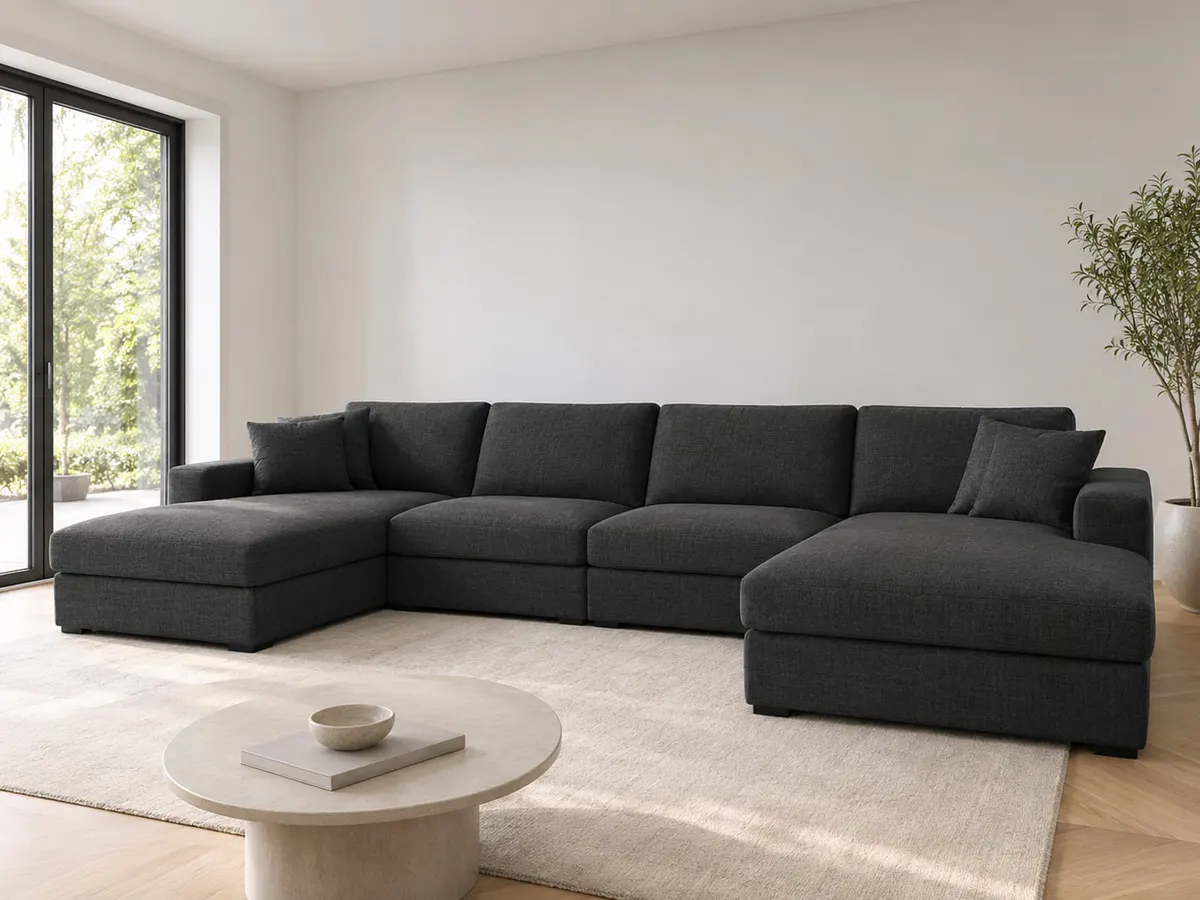 wohnlandschaft Wohnlandschaft Cordoba anthrazit Webstoff von POCO in Anthrazit in einem hellen Wohnzimmer